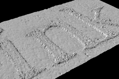 Not only do the images produced by GelSight, a new, portable imaging system from researchers in the Department of Brain and Cognitive Sciences, have a resolution that previously required expensive laboratory equipment, but they're 3-D, too. Here, GelSight images particles of ink spelling the word 'ink' on a piece of paper.
