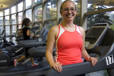 As part of the 2011 Tri-Challenge, graduate student Stacy Maheras puts in some miles on the treadmill at MIT's Zesiger Sports and Fitness Center. Participants in the Tri-Challenge complete an Ironman Triathlon — but over a month's time.