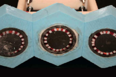 Based on simulations, the researchers have developed a manufacturing technique that can combine multiple modules as shown above. Here, three modules are mounted on a base of silicon rubber. The overall unit bends freely, so it can conform and adhere tightly to a curved surface such as the outside of a pipe. Despite their proximity, the three modules operate independently with no interference.