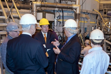 Congressman Chris Murphy (in yellow hard hat) listens to MIT alumnus Reiner Beeuwkes during his visit to the Alcator C-Mod cell. He was also accompanied by PSFC Director Miklos Porkolab (foreground left), Alcator Project Head Earl Marmar and Associate Director Martin Greenwald (foreground right).