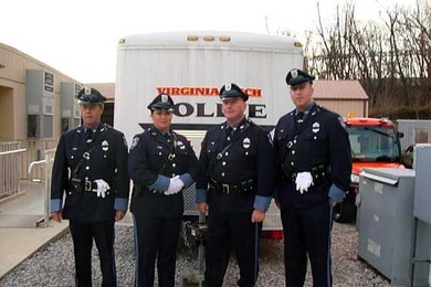 From left: Patrol Officer Bill Smith, Patrol Officer Katrina Thompson, Patrol Officer Kevin O'Connor and Patrol Officer David Smith attended the Dec. 12 services honoring fallen Virginia Tech campus police officer Deriek Crouse.