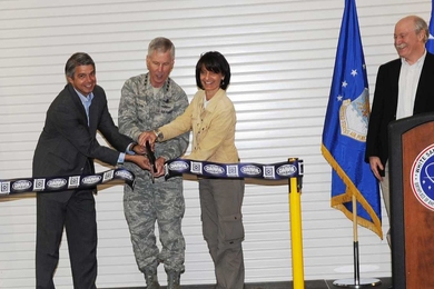 Cutting the ribbon to 'inaugurate' the Space Surveillance Telescope (SST) are, from left to right, Eric Evans, director of MIT Lincoln Laboratory; General William Shelton, commander of Air Force Space Command; and Dr. Regina Dugan, director of the Defense Advanced Research Projects Agency, which sponsored the development of the SST. At the podium is Grant Stokes, head of the Aerospace Division, wh...