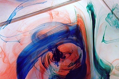 The 'weather in a tank' curriculum includes several rotating tank experiments, which are designed to help students understand how Earth's atmosphere and oceans work. An image from the dye stirring experiment is shown here.