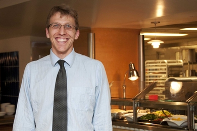Front-of-House Manager Eric Ballhaussen ensures a high-quality dining experience in Baker House.