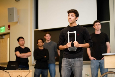 Karan Mudgal, of RISD, describes the features of the bicycle lock that he and his team designed.

From left to right: Kai Liao (Aeronautics and Astronautics), Tejas Inamdar (mechanical engineering), Cullen Johnson (LGO), Karan Mudgal (RISD), David Linders (LGO)