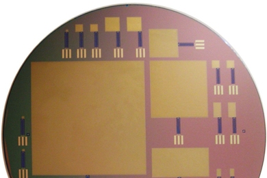 This silicon wafer consists of glucose fuel cells of varying sizes; the largest is 64 by 64 mm.