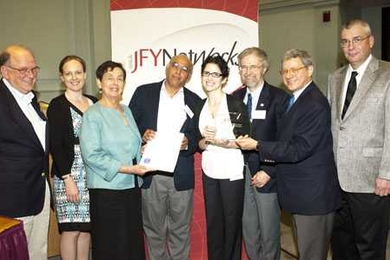 From left to right: Chuck Shubert, Alison Brauneis, Representative Alice Peisch, Vijay Kumar, Lourdes Alemán, Graham Walker, Gary Kaplan, David Stanley.