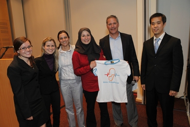 Members of the Sana AudioPulse team after winning the Mobile Health Challenge. From left to right: Lauren Scanlon (NEU/MIT), Anna Giselle Ribeiro (UFRN), Ana Maria Guerreiro  (UFRN), Marzyeh Ghassemi (MIT/CSAIL), GSMA organizer, Kenneth Paik (Harvard/MIT).