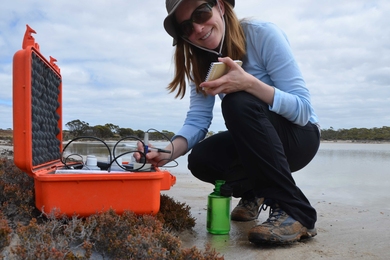 Johnson collecting samples in the Australian outback