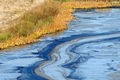 Photo of an oil spill in water