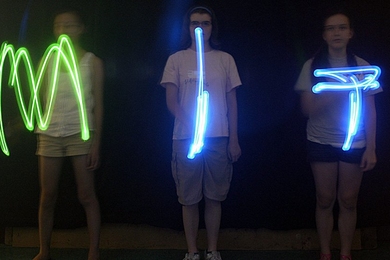 Ninth-grade girls in the Edgerton Center's You GO Girl science and engineering program experimenting with strobe-light photography.