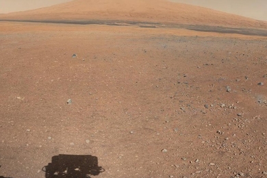 This color panorama shows a view of the landing site of NASA's Curiosity rover, including the highest part of Mount Sharp visible to the rover.