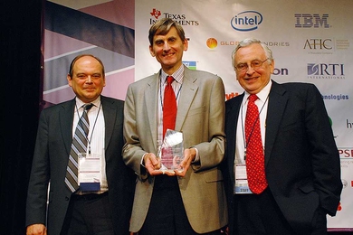 Photo: Jes&uacute;s del Alamo (standing middle) receives the Semiconductor Research Corporation 2012 Technical Excellence Award from Steven Hillenius, SRC Executive Vice President (left) and Larry Sumney, SRC President & CEO (right), at the TECHON Conference in Austin TX Sept. 10, 2012.