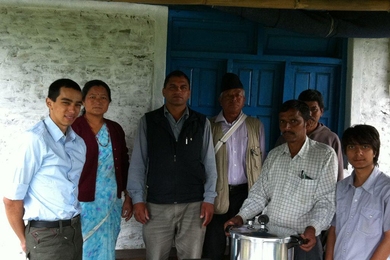 Greg Tao &#39;10, SM &#39;12 (left), delivers an autoclave prototype to a rural Nepali health clinic in January 2012.