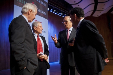 MIT President L. Rafael Reif, second from right, talks with, from left, Magnanti, Moavenzadeh and Crawley after the session.