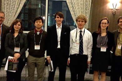 From left to right: Professor Cary Forest, University of Wisconsin, 2012 Chair of DPP; Victoria Winters; four other student award winners; Professor Paul Miller of West Virginia University, the APS-DPP Sub-Committee Chair for Education and Outreach.