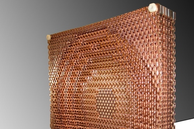 The orientation of 4,000 S-shaped units forms a metamaterial lens that focuses radio waves with extreme precision, and very little energy lost.