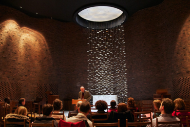 Chaplain to the Institute Robert Randolph, center, speaks during an event in the MIT Chapel.