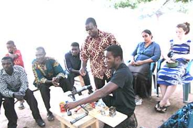 Kwami Williams '12 worked with the New Longoro Farmers cooperative in Ghana to develop a Moringa oil press.