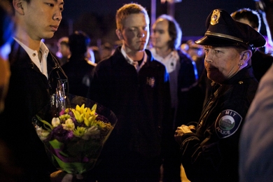 MIT Police Sergeant Cheryl Vossmer talks with students from the MIT-EMS, who were first to respond to the fatal shooting.
