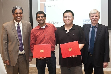 SuperUROP students Arun Saigal and Weihua Li celebrated receiving their SuperUROP certificates with Professors Anantha Chandrakasan, at left, and Dennis Freeman, who taught the two-semester class.