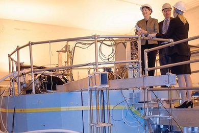 U.S. Senator Jeanne Shaheen, Alcator C-Mod Head Earl Marmar and Nuclear Engineering Assistant Professor Anne White view the Alcator C-Mod Project from atop the tokamak.