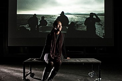 Renée Green is shown before an image from her feature film, +Endless Dreams and Water Between.+