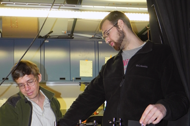 Alexei A. Maznev (left) and Jeffrey K. Eliason with time-resolved optical spectroscopy used to demonstrate ballistic acoustic phonon transport in silicon.  