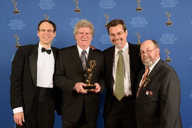 From left: Frederick E. Harris Jr., Larry Gallagher, Chris Boebel, and Craig Milanesi with their New England Emmy Award.