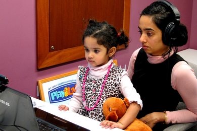 Parent and child using the Lookit website.