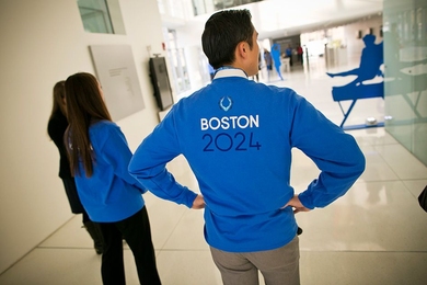 Shirts with the Boston 2024 logo.