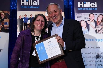 Eric Fingerhut and Rabbi Michelle Fisher SM ’97