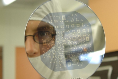 Researcher looks at reflection of chrome plated device