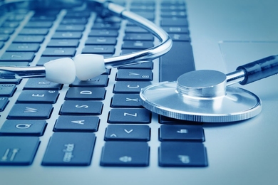 Stethoscope on laptop keyboard