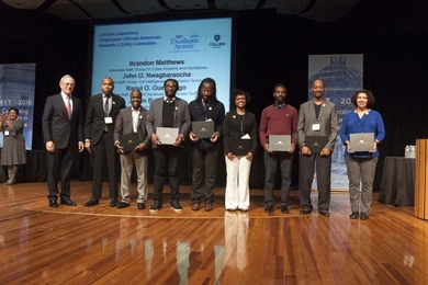 MIT Lincoln Laboratory African American Employees’ Network Committee members are presented with the Advancing Inclusion and Global Perspectives award from President L. Rafael Reif.