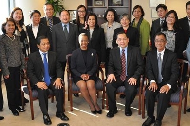Deputy Director Enoh T. Ebong welcomes a delegation of high-level Philippine Government officials at USTDA's headquarters. 