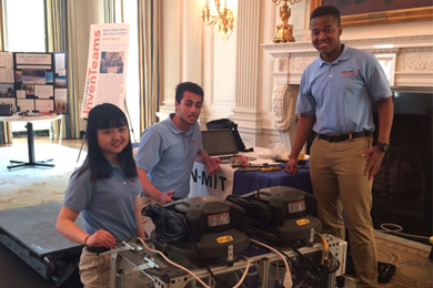 At the 2016 White House Science Fair, Baruch College Campus High School InvenTeam members Wendy Ni (left), Amro Halwah (center), and Stephen Mwingira show off their modular cleaning device that attaches to existing trains on city subway tracks.