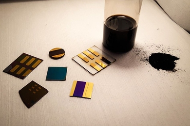 “When you look at coal as a material, and not just as something to burn, the chemistry is extremely rich,” says Jeffrey Grossman. In this photo, a sample of pulverized coal (right) is shown with several test devices made from coal by the MIT researchers.