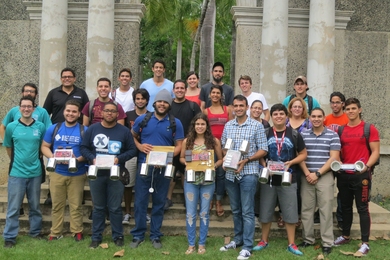 Students from the University of Puerto Rico at Mayagüez, photographed here with MIT Lincoln Laboratory instructors for a three-day build-a-radar workshop, show off the small "coffee-can" systems they built and demonstrated.
