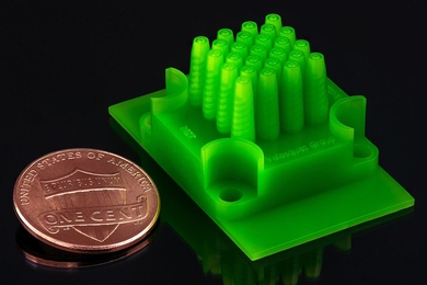 A new microencapsulation technique yields particles of very consistent size, while also affording a high rate of production.  The device, pictured here, that produces the spheres was itself manufactured with an affordable commercial 3-D printer. 