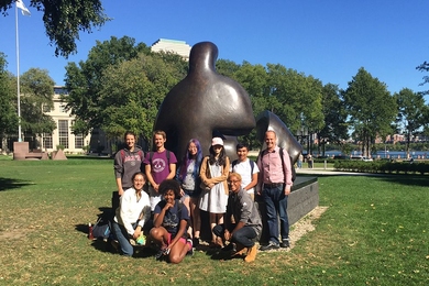 Professor John Ochsendorf and his freshman seminar students stand in front of Henry Moore's "Three-Piece Reclining Figure, Draped."