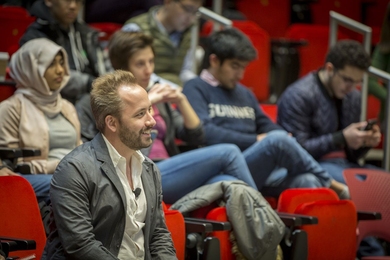 Dropbox CEO Drew Houston '05 (seated, front left) stopped by MIT on Feb. 3 for a "fireside chat" with students. The event was part of StartMIT, a workshop on entrepreneurship organized by the Department of Electrical Engineering and Computer Science. 