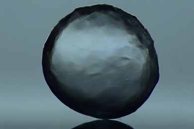 A new surface coating developed by Kripa Varanasi and his team causes water to bead up on the inner surface of a pipe rather than spreading out. This prevents the formation of ices that could lead to a clog in an oil pipeline or well.