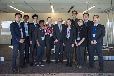 JR East Professor Joseph Sussman (center) is joined by current Regional Transportation Planning and High-Speed Rail Research Group graduate students and local alumni at the celebration of the 25th anniversary of the JR East-MIT partnership in March. Sussman is retiring after 50 years at MIT. 