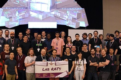 Thirty-eight Lab RATs, weary after 52 hours of hacking their competitors' computer networks, posed for a team photograph at the DEF CON Capture the Flag competition held at Caesar's Palace in Las Vegas.