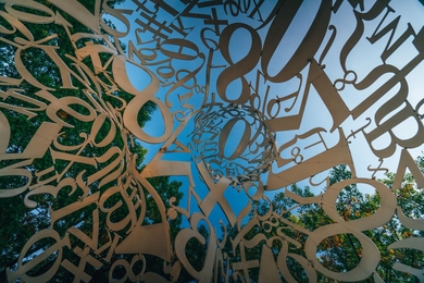 Alchemist statue, which is series of numbers and letters