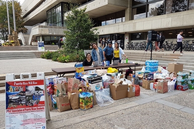 MIT students collect donations for Puerto Rico hurricane relief efforts outside of the Stratton Student Center.