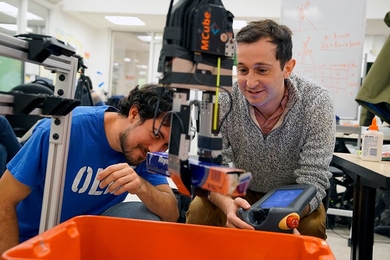 The “pick-and-place” system consists of a standard industrial robotic arm that the researchers outfitted with a custom gripper and suction cup. They developed an “object-agnostic” grasping algorithm that enables the robot to assess a bin of random objects and determine the best way to grip or suction onto an item amid the clutter, without having to know anything about the object before pic...