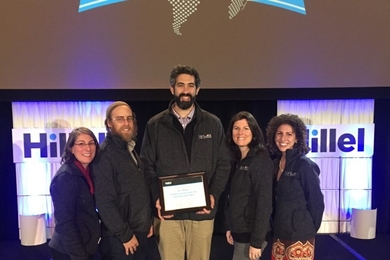 MIT Hillel accepts the Phillip and Susan Rudd Cohen Outstanding Campus Award at the Hillel International Global Assembly held in Denver.