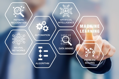 A finger points to one of multiple icons on a screen